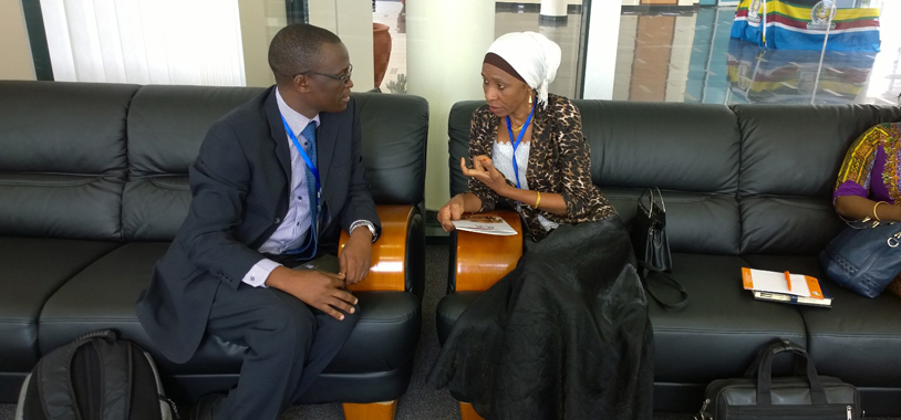Hon. Dr. Sira Ubwa Mamboya, the Minister for Natural resources and agriculture of Zanzibar in discussions with Dr Benson Okita-Ouma of Save the Elephants at the Arusha Summit